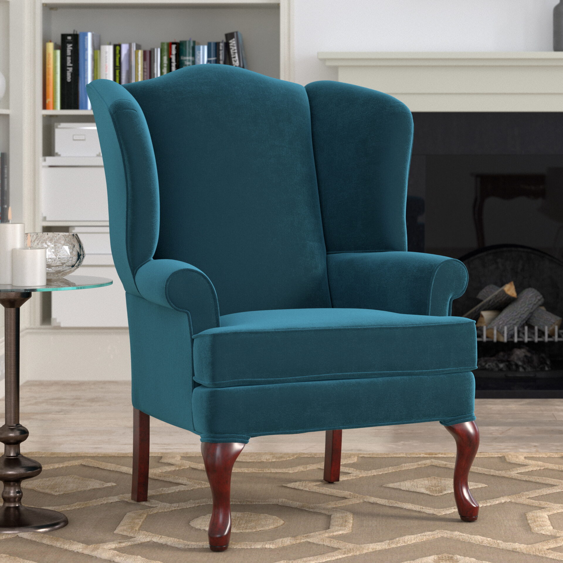 A teal chair with curved legs