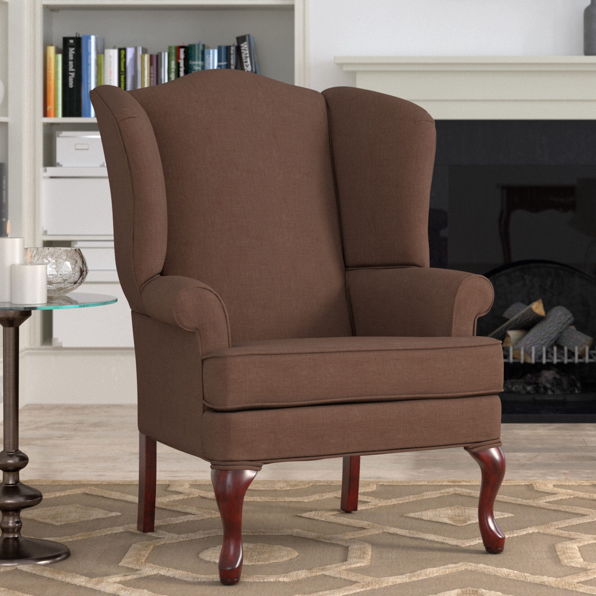 A coffee brown chair with curved legs