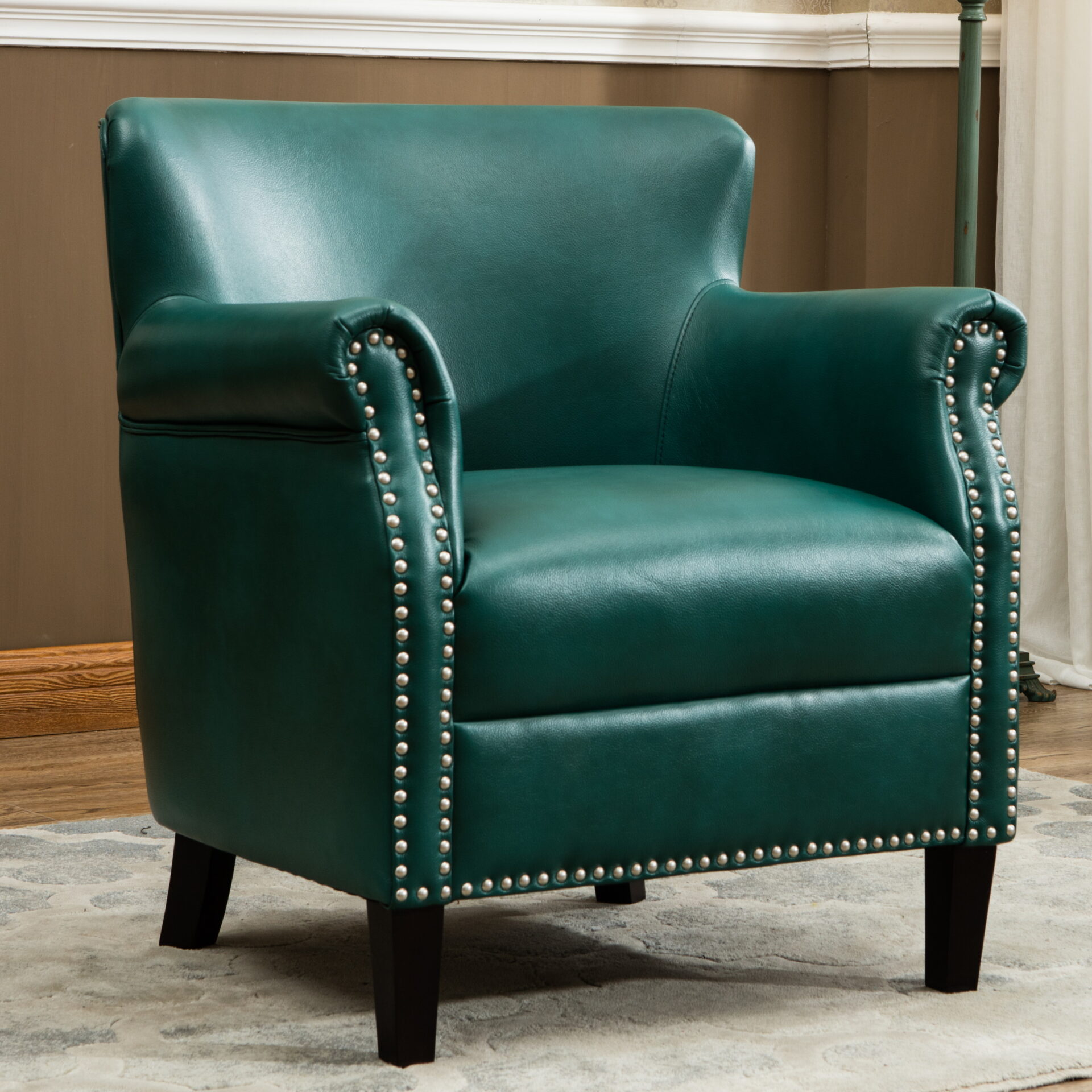 A green leather chair