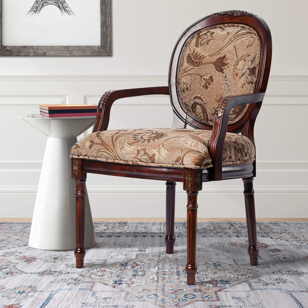 A wooden chair with a floral design