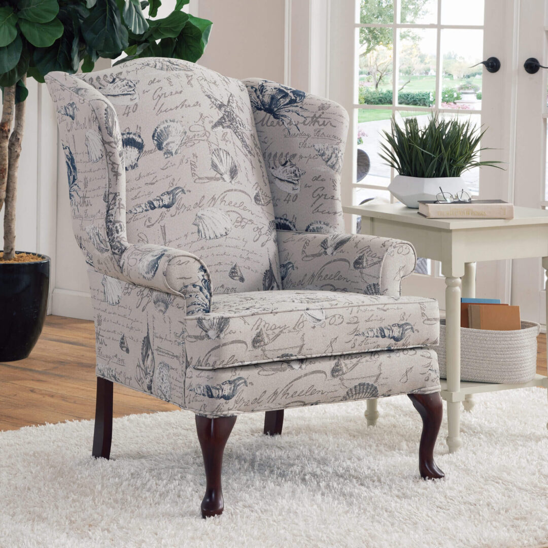 A gray chair with printed designs