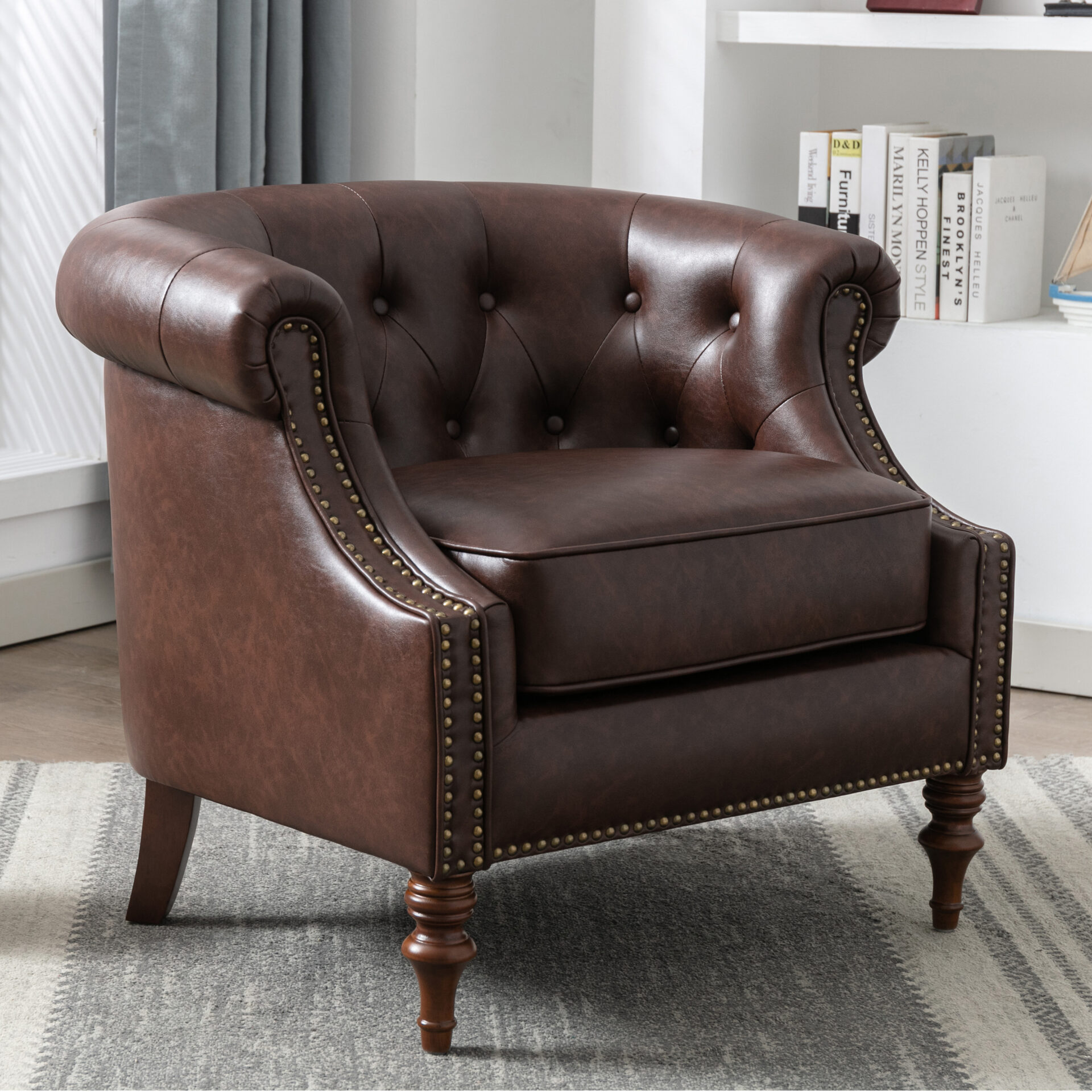 A picture of the brown color sofa with gold buttons