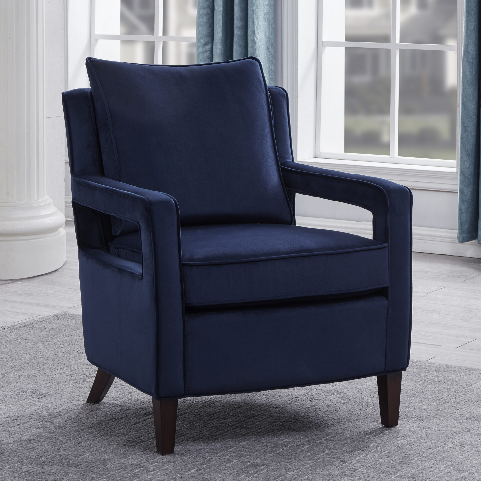 A blue color chair with soft cushion